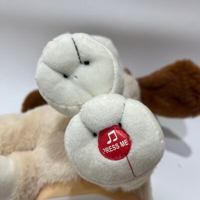 Schattige dansende hondenknuffel met leuke muziekfuncties